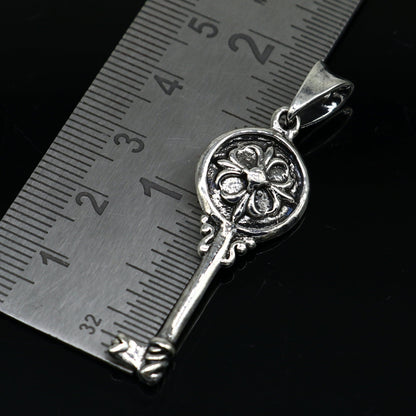 Vintage style 925 sterling silver key pendant for boys and girls, handmade tribal design, stylish and attractive jewelry accessory.