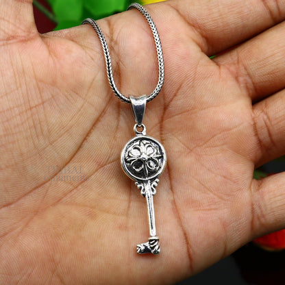 Sterling silver vintage style key pendant by TRIBAL ORNAMENTS, handmade jewelry for boys and girls, detailed and stylish design.