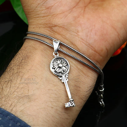 Vintage style 925 sterling silver key pendant by TRIBAL ORNAMENTS, featuring handmade intricate design for boys and girls.
