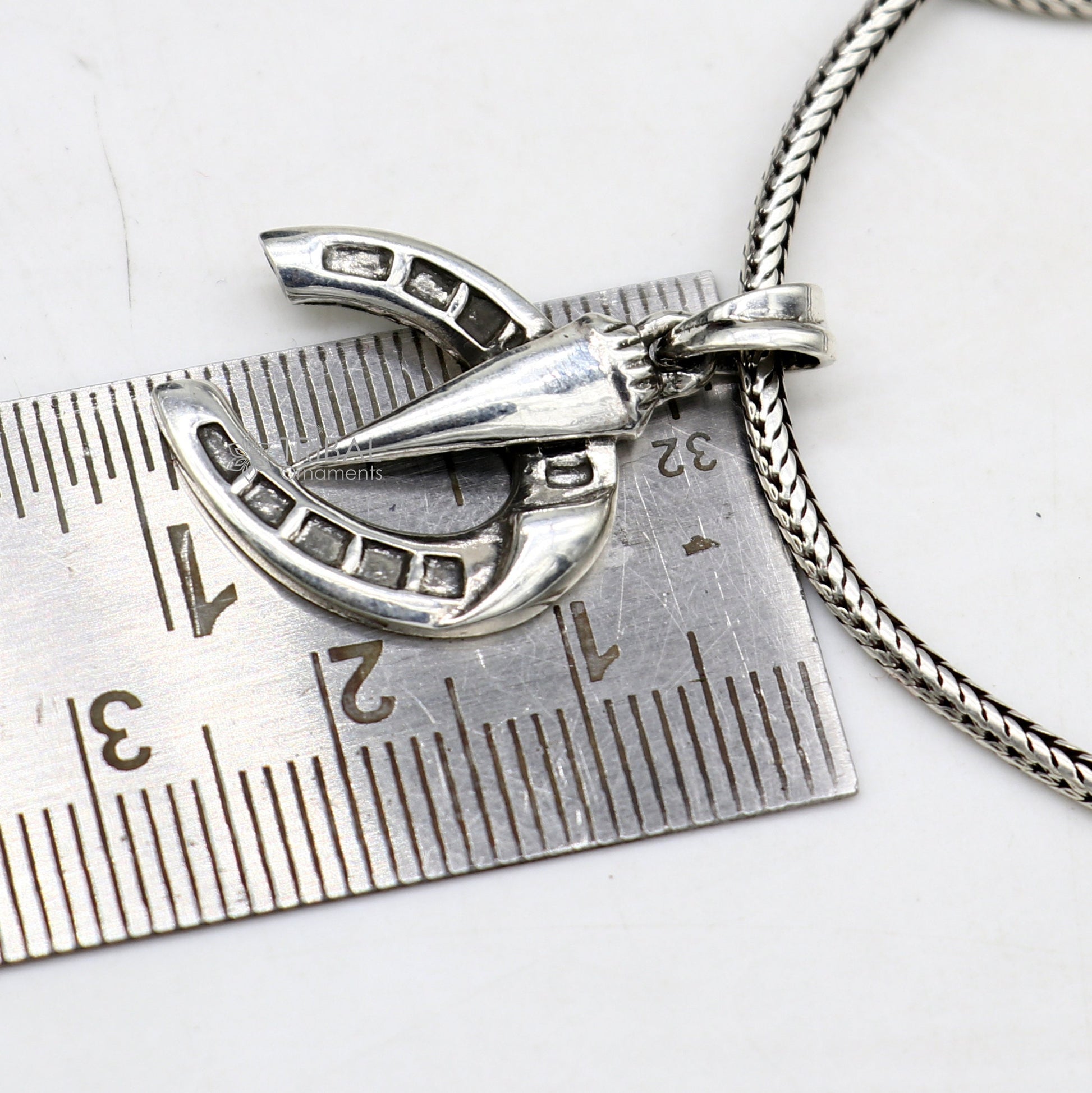 Sterling silver horseshoe pendant by Tribal Ornaments, handmade charm for boys and girls, small silver jewelry piece.