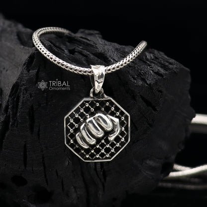 925 sterling silver wrist punch pendant featuring intricate handmade tribal design for boys and girls, ideal for gym or ZYM wear.