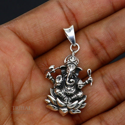 Sterling silver Ganesha pendant by TRIBAL ORNAMENTS, unisex handmade jewelry with intricate divine blessing design.