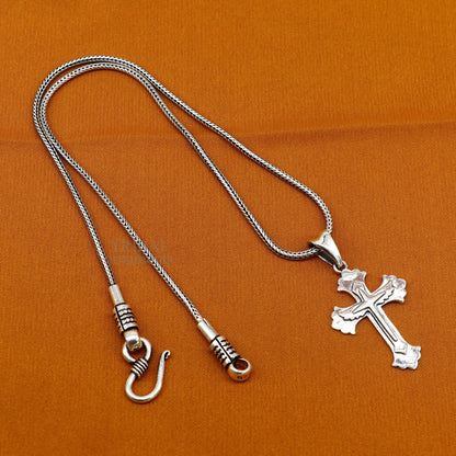 Sterling silver holy cross pendant by TRIBAL ORNAMENTS, unisex jewelry with a detailed divine design, perfect for stylish accessories.