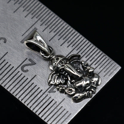 Sterling silver Lord Ganesha pendant by Tribal Ornaments, handmade unisex jewelry with intricate divine Ganesha design.