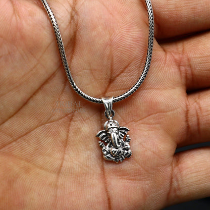 Unisex 925 sterling silver Lord Ganesha pendant from Tribal Ornaments, featuring intricate handmade divine jewelry design.