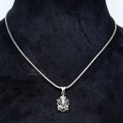 Sterling silver Lord Ganesha pendant, handmade unisex jewelry by TRIBAL ORNAMENTS featuring intricate divine design.