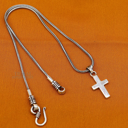 Elegant 925 sterling silver holy cross pendant from TRIBAL ORNAMENTS, stylish unisex jewelry with unique design from India.