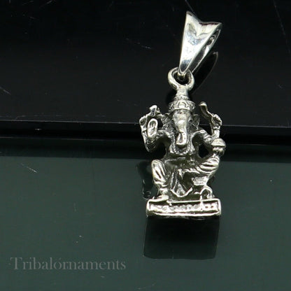 Elegant 925 sterling silver Lord Ganesha blessing pendant, handmade unisex jewelry with intricate divine design from Tribal Ornaments.