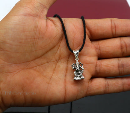Elegant 925 sterling silver Lord Ganesha blessing pendant, handmade unisex jewelry with intricate tribal design from India.