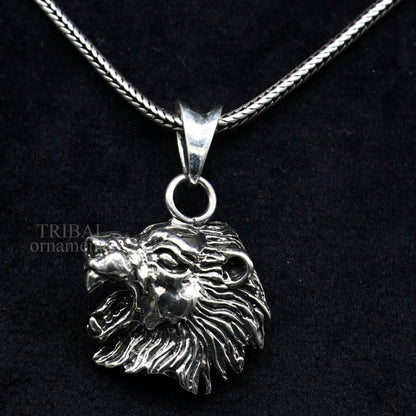 Sterling silver lion face pendant by TRIBAL ORNAMENTS, handcrafted unisex jewelry with detailed tribal design, ideal for gifting.