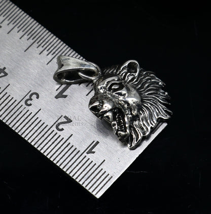 Elegant 925 sterling silver lion face pendant by TRIBAL ORNAMENTS, featuring a detailed handmade unisex jewelry design.