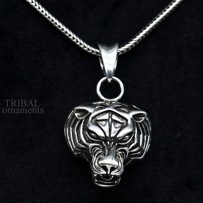 Sterling silver unisex tiger face pendant by Tribal Ornaments, handmade jewelry with intricate tribal design, ideal for gifting.