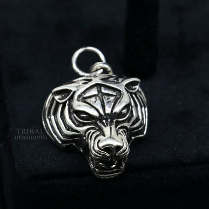 Elegant handmade 925 sterling silver tiger face pendant by Tribal Ornaments, unisex jewelry for gifting or everyday wear.