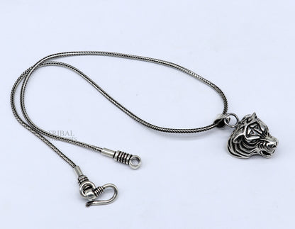 Sterling silver tiger face pendant by Tribal Ornaments, unisex handmade jewelry with intricate design, ideal for gifting.