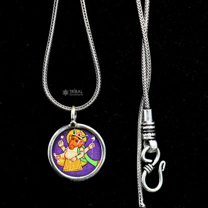 Sterling silver handmade Ganesha pendant featuring intricate painting, unisex design, ideal for gifting or jewelry collection.