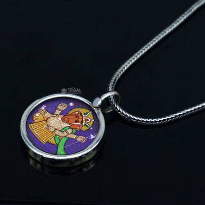 Sterling silver handmade Ganesha pendant featuring intricate painting, unisex design, ideal for gifting, by TRIBAL ORNAMENTS.