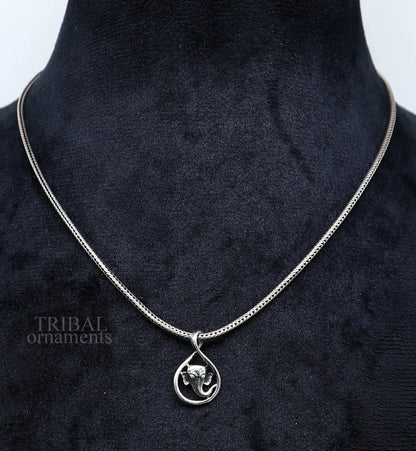 Sterling silver Lord Ganesha pendant by TRIBAL ORNAMENTS, handmade unisex jewelry with intricate divine design.
