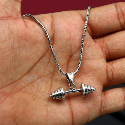 Sterling silver barbell dumbbell pendant from TRIBAL ORNAMENTS, unisex jewelry with an exclusive tribal design.