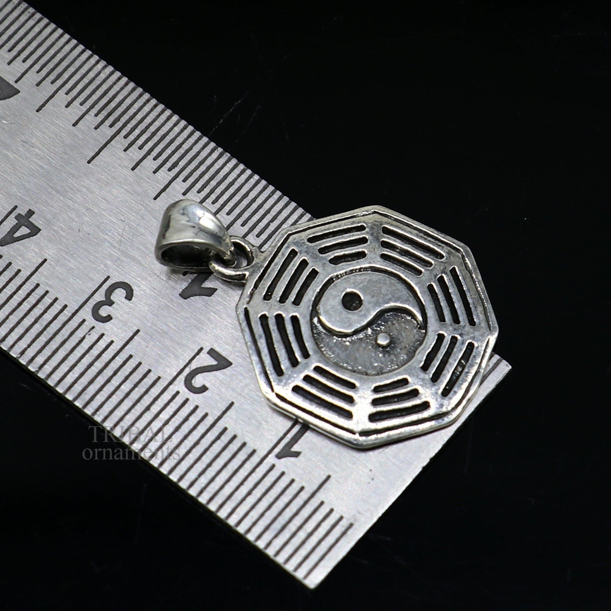 925 sterling silver unisex pendant with a round tribal design, perfect for personalized gift jewelry by TRIBAL ORNAMENTS.