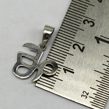 Sterling silver Ek Onkar Sikh pendant by Tribal Ornaments, handmade unisex jewelry with intricate design, personalized gift accessory.