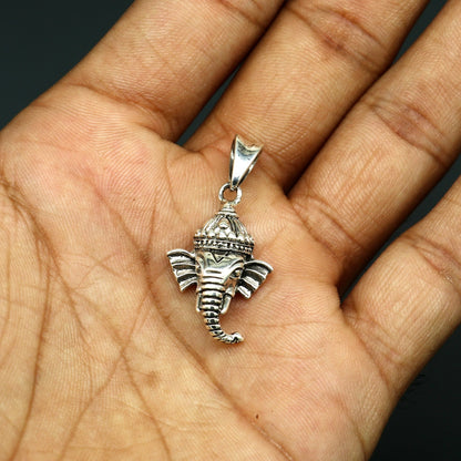 Sterling silver Lord Ganesha pendant by TRIBAL ORNAMENTS, unisex handmade jewelry with unique design, perfect personalized gift.