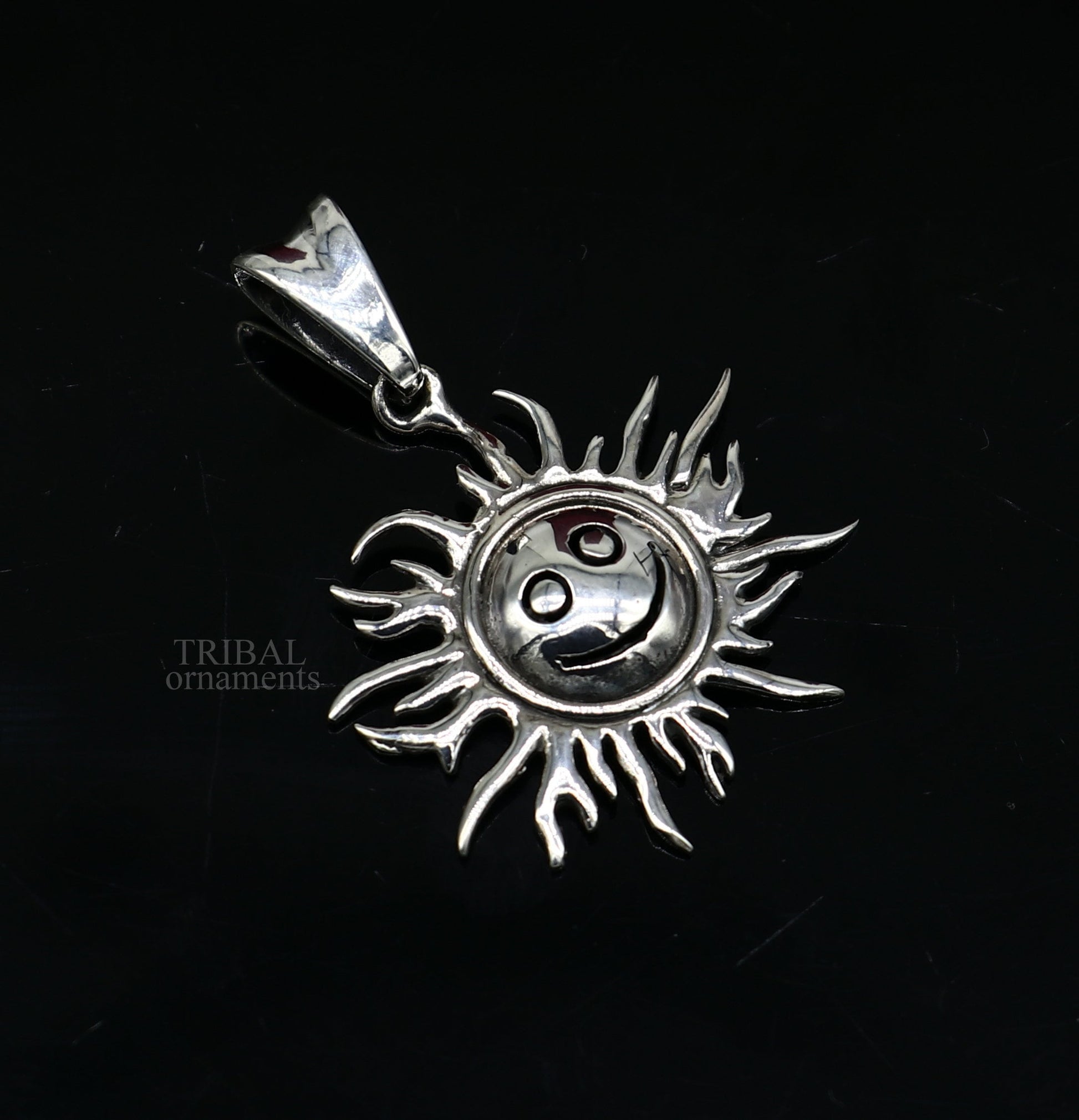 Handmade 925 sterling silver sun face pendant with ethnic design, showcasing vintage tribal jewelry craftsmanship.
