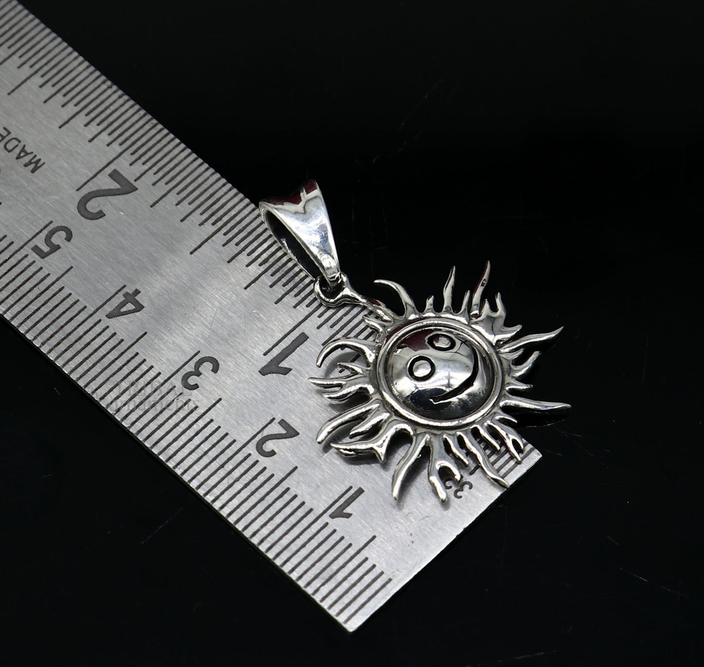Handmade 925 sterling silver sun face pendant with tribal design, ethnic divine jewelry by TRIBAL ORNAMENTS.