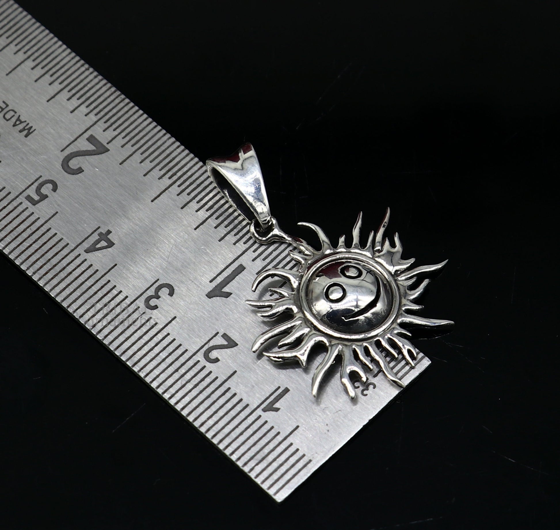 Handmade 925 sterling silver sun face pendant with tribal design, ethnic divine jewelry by TRIBAL ORNAMENTS.