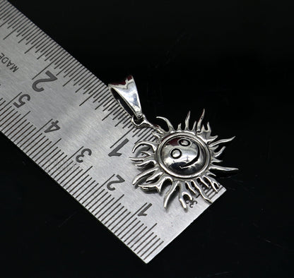 Handmade 925 sterling silver sun face pendant with tribal design, ethnic divine jewelry by TRIBAL ORNAMENTS.