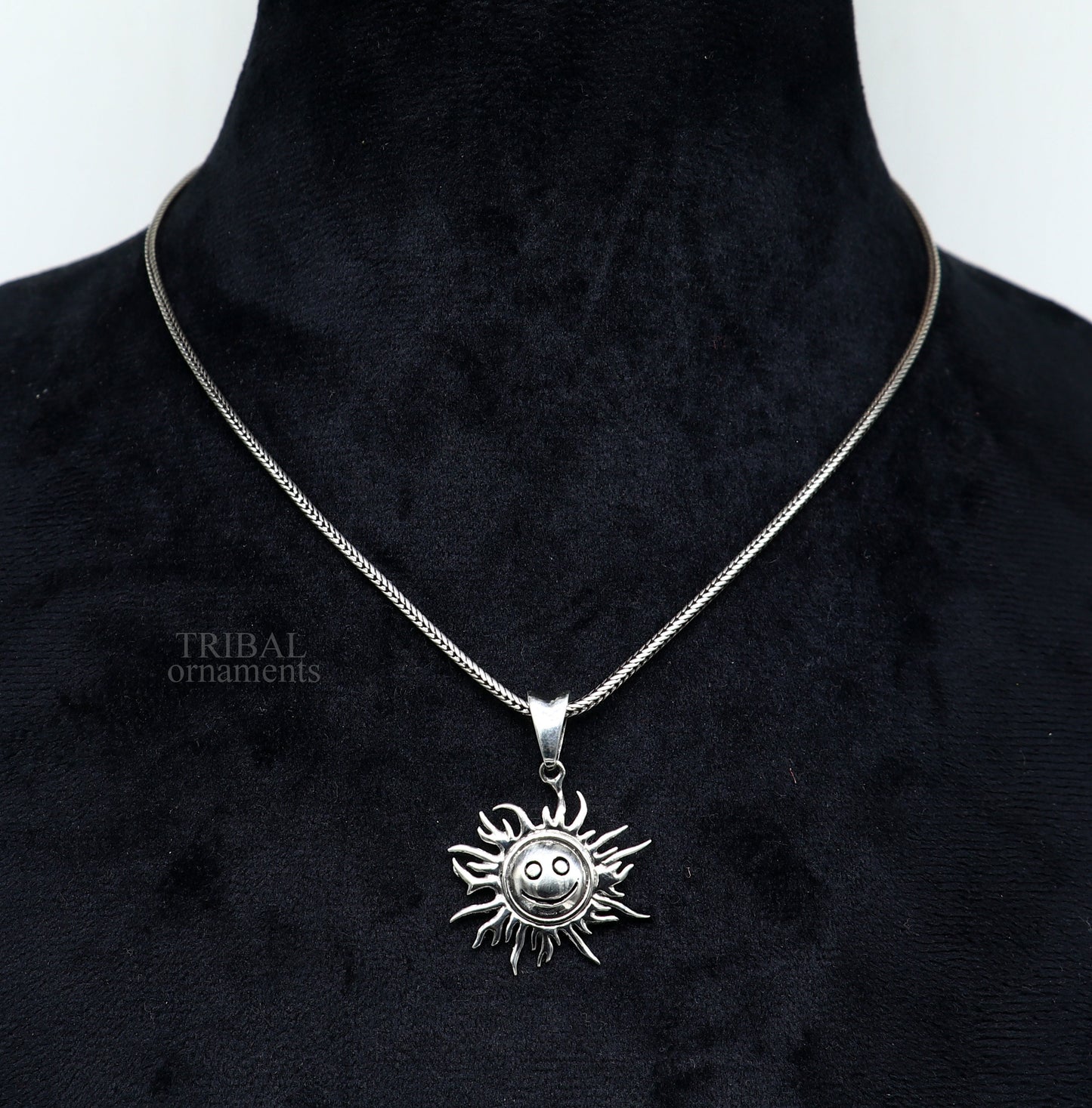 Handmade 925 sterling silver sun face pendant with intricate ethnic design, showcasing divine tribal jewelry craftsmanship.