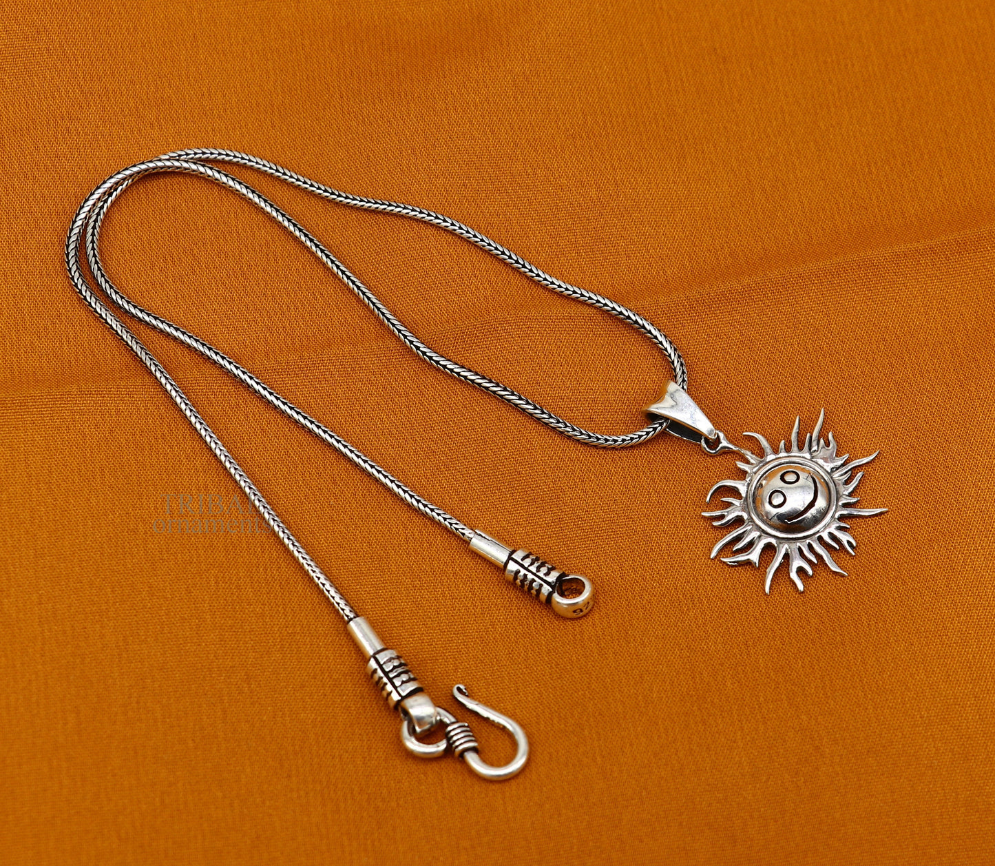 Handmade 925 sterling silver sun face pendant with ethnic design, intricate vintage jewelry by TRIBAL ORNAMENTS.