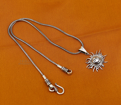 Handmade 925 sterling silver sun face pendant with ethnic design, intricate vintage jewelry by TRIBAL ORNAMENTS.