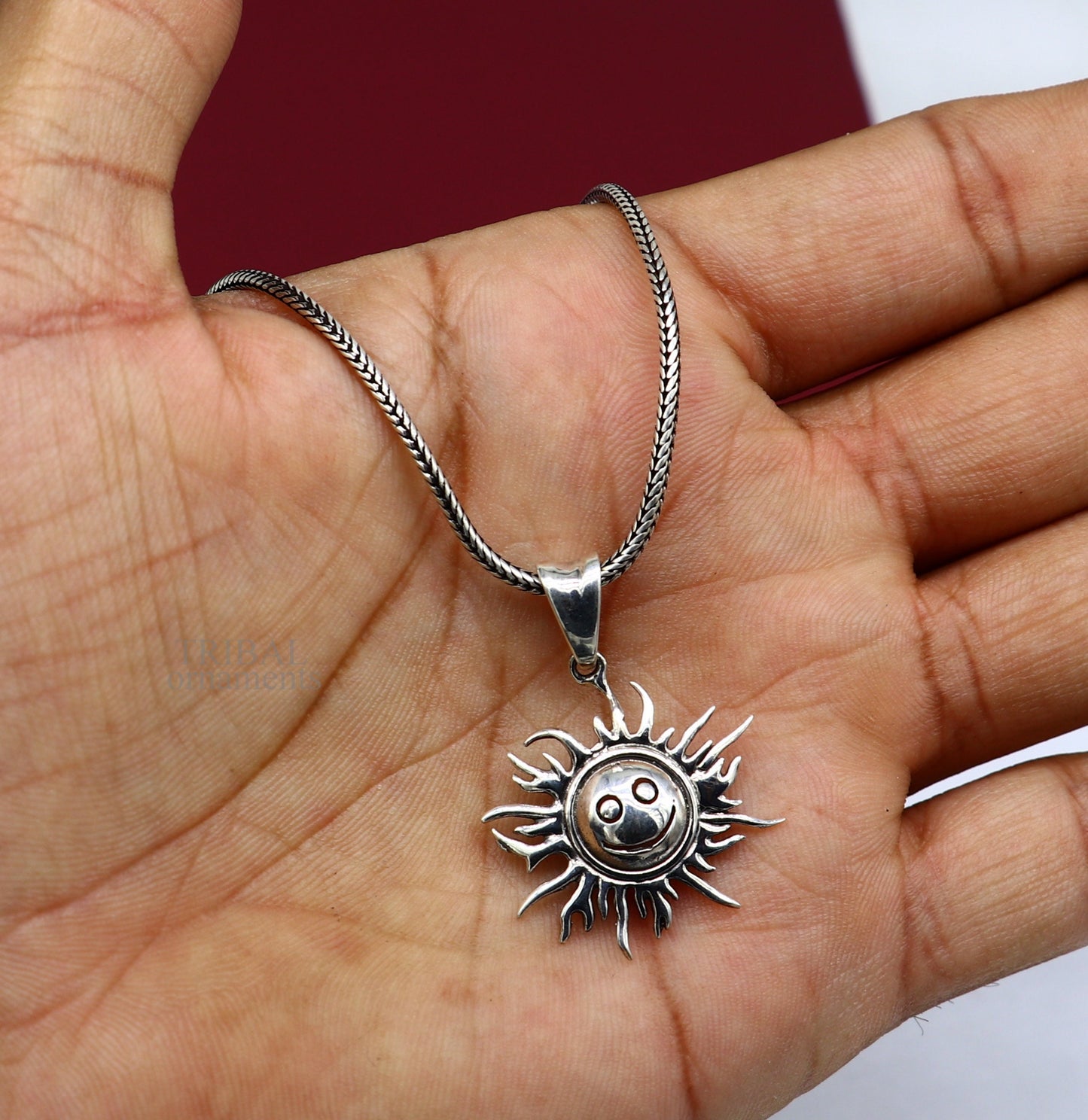 Handmade 925 sterling silver sun face pendant featuring ethnic vintage design, divine jewelry by TRIBAL ORNAMENTS.