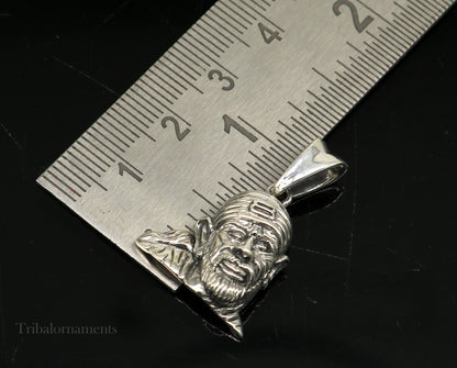Sterling silver Idol Sai Baba pendant by Tribal Ornaments, handmade unisex jewelry with intricate design and personalized style.