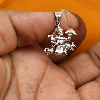 Sterling silver Hanuman idol pendant with mount, handcrafted tribal jewelry featuring detailed craftsmanship and intricate design.