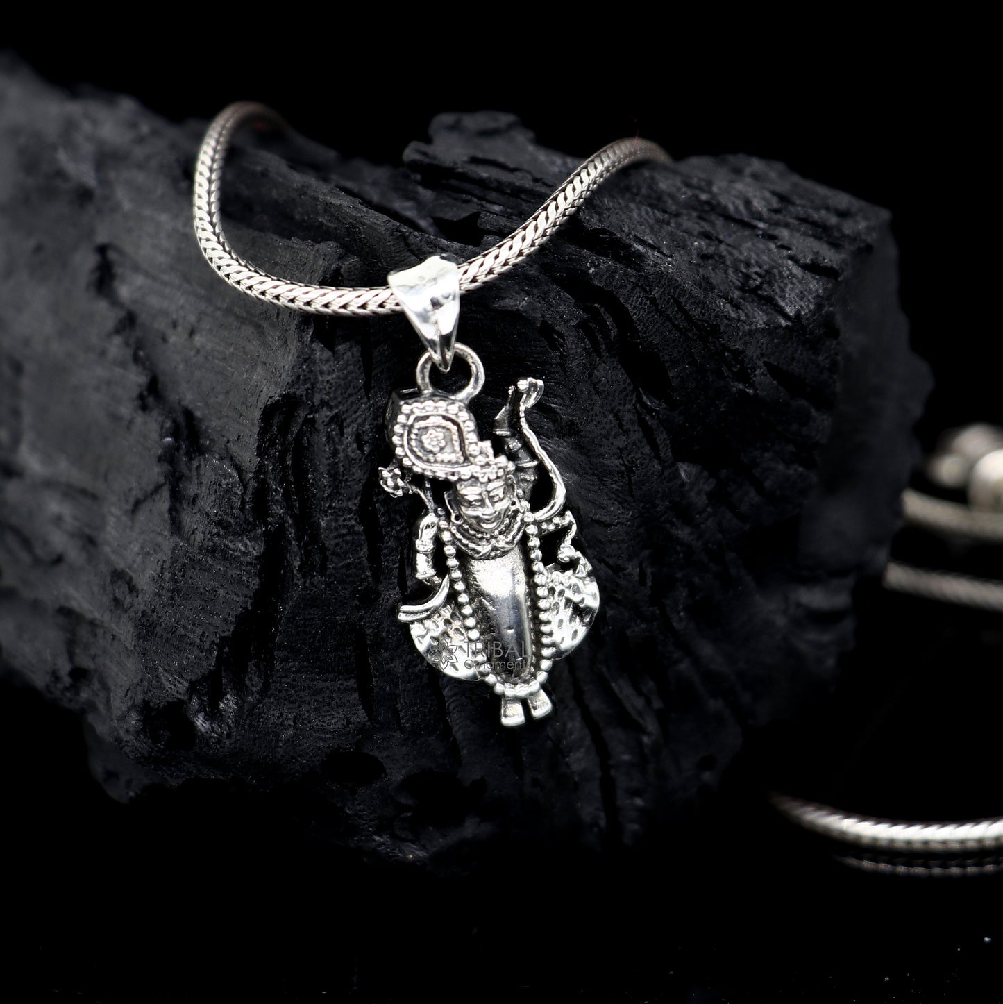 Small Lord Krishna Goverdhan pendant in 925 sterling silver, featuring intricate design, symbol of love, wisdom, and spirituality.