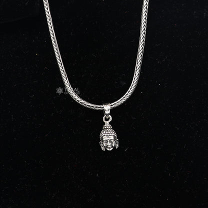 925 silver Lord Buddha face pendant by TRIBAL ORNAMENTS, worn close to the heart, symbolizing inner peace and wisdom.