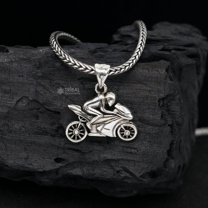 Sterling silver bike pendant by TRIBAL ORNAMENTS, showcasing a stylish, unisex motorcycle or bike lover jewelry design.