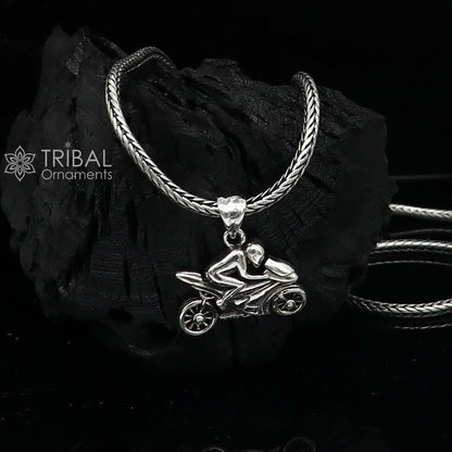 Sterling silver bike pendant from TRIBAL ORNAMENTS, stylish unisex jewelry for bike lovers featuring detailed motorcycle design.