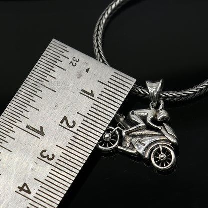 Sterling silver bike pendant by Tribal Ornaments, stylish unisex jewelry for bike lovers, detailed motorcycle design.