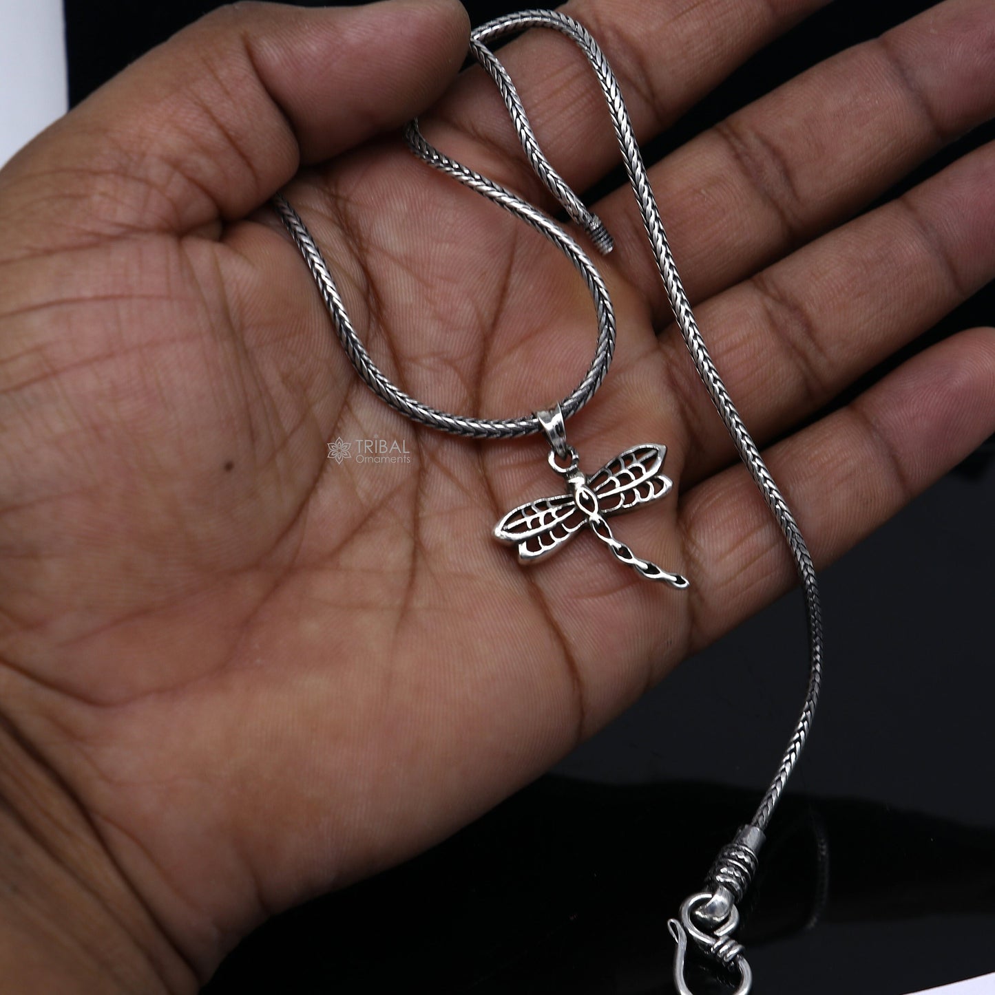 Sterling silver butterfly pendant by Tribal Ornaments, unisex jewelry with intricate butterfly design and high-quality craftsmanship.
