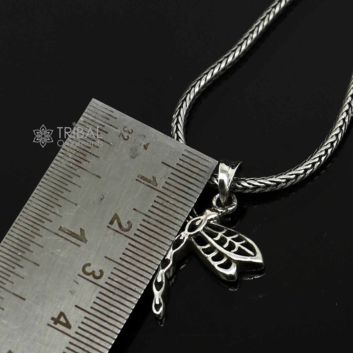 Sterling silver butterfly pendant by TRIBAL ORNAMENTS, unisex jewelry with intricate butterfly design in high-quality 925 silver.