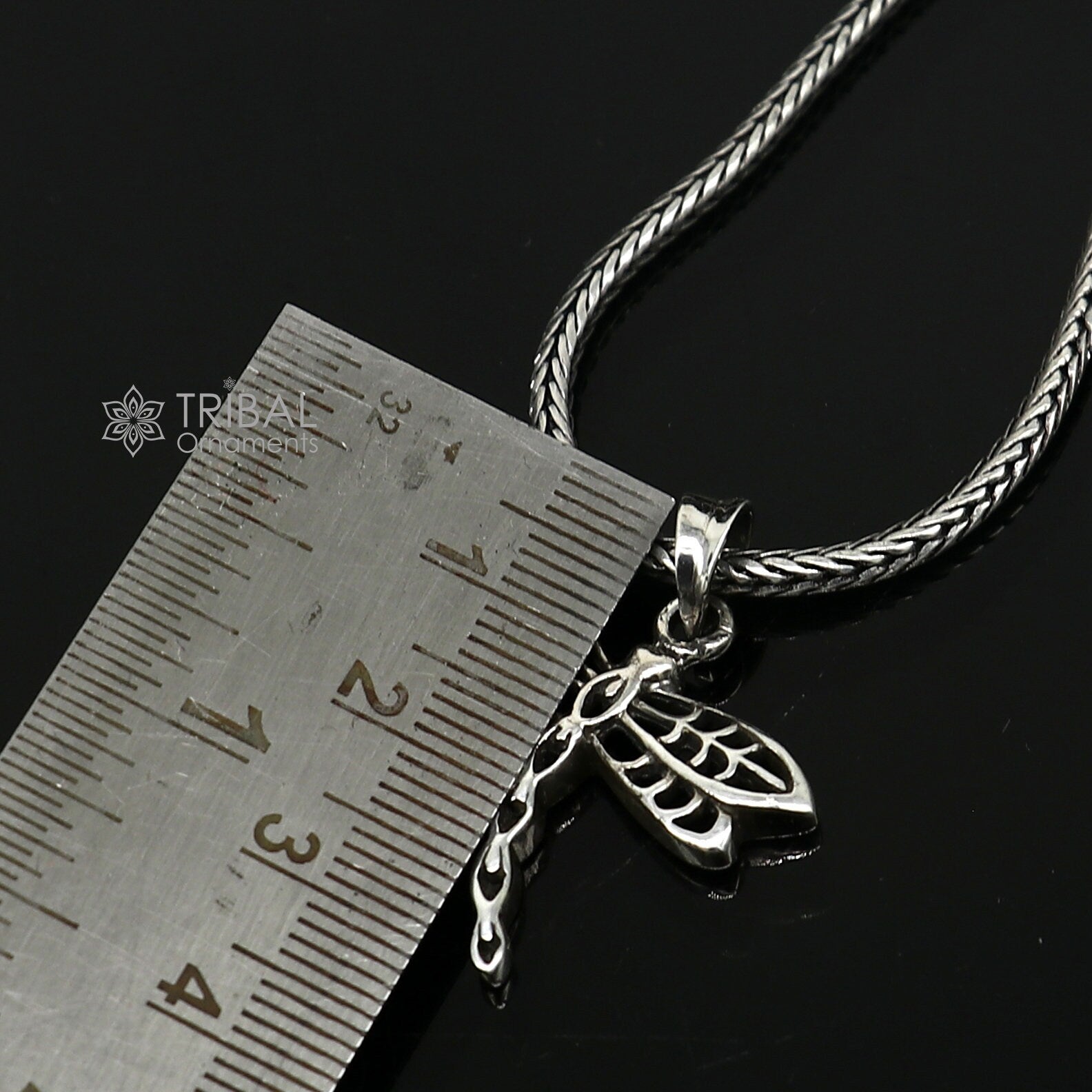 Sterling silver butterfly pendant by TRIBAL ORNAMENTS, unisex jewelry with intricate butterfly design in high-quality 925 silver.