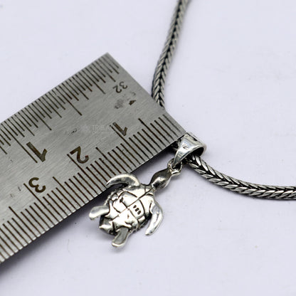 Sterling silver Tortoise pendant necklace by Tribal Ornaments, featuring a detailed divine tortoise charm symbolizing wisdom and stability.