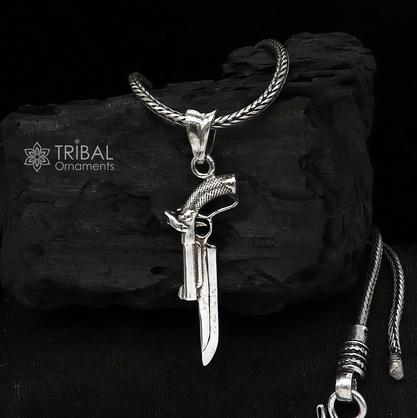 Sterling silver gun pendant by Tribal Ornaments, unisex jewelry featuring a stylish revolver design for gifting or personal style.