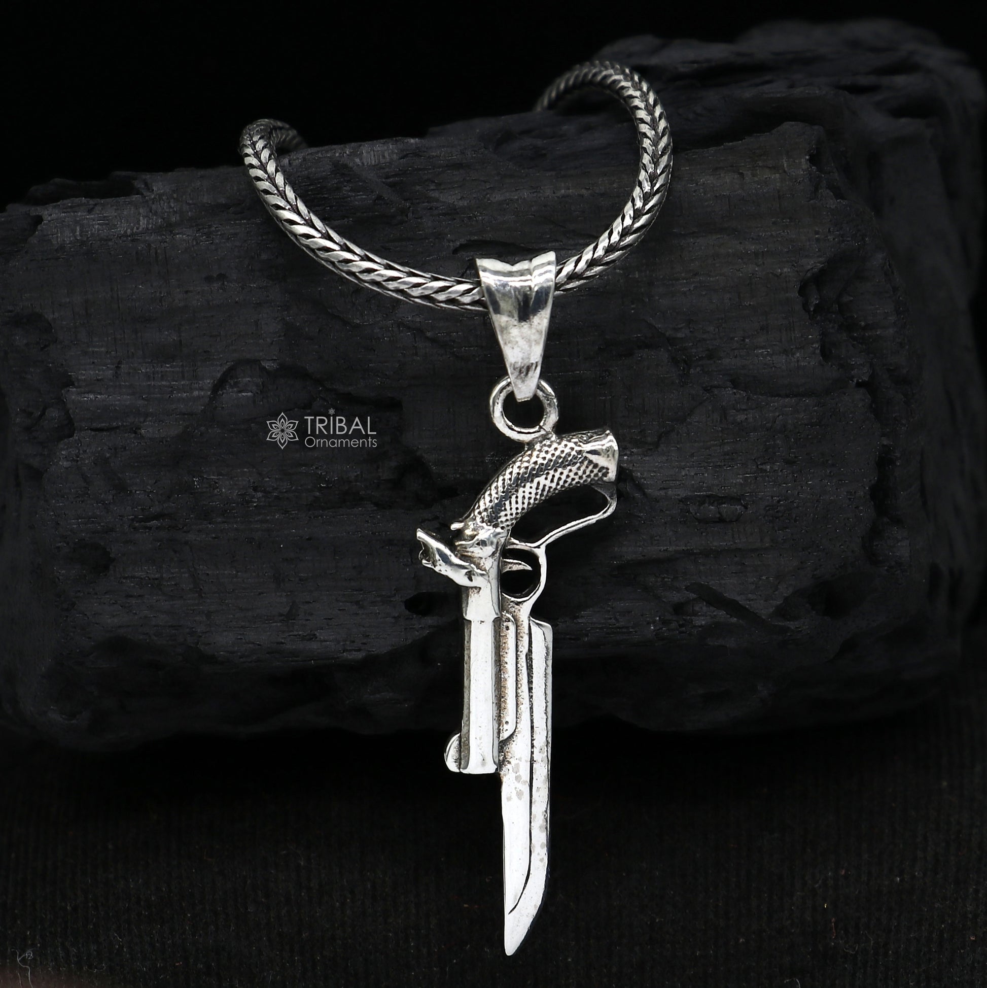 Sterling silver gun pendant by Tribal Ornaments, unisex revolver jewelry, stylish and unique jewelry gift accessory.