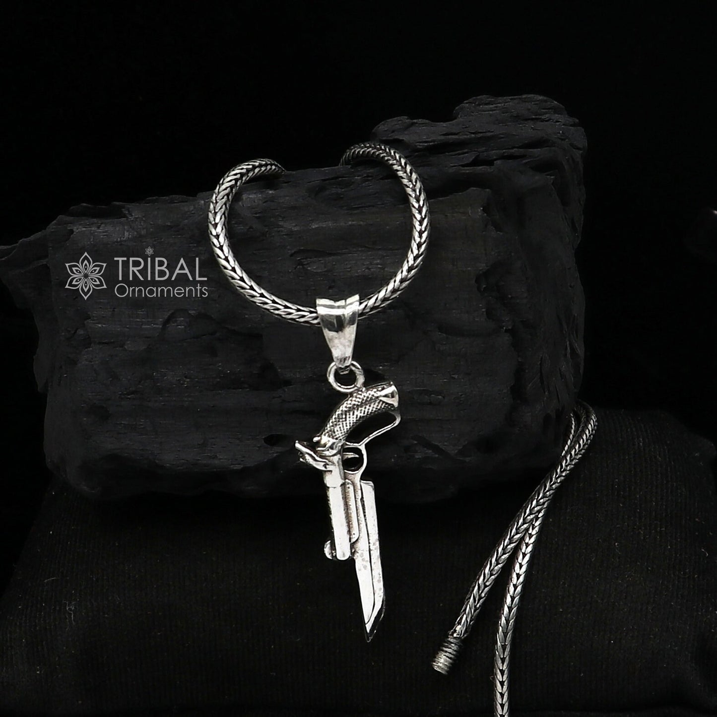 Sterling silver gun pendant by Tribal Ornaments, unisex jewelry featuring a stylish revolver design, perfect for gifting.