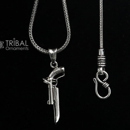 Sterling silver gun pendant by Tribal Ornaments, unisex revolver jewelry featuring detailed design for stylish gifting.