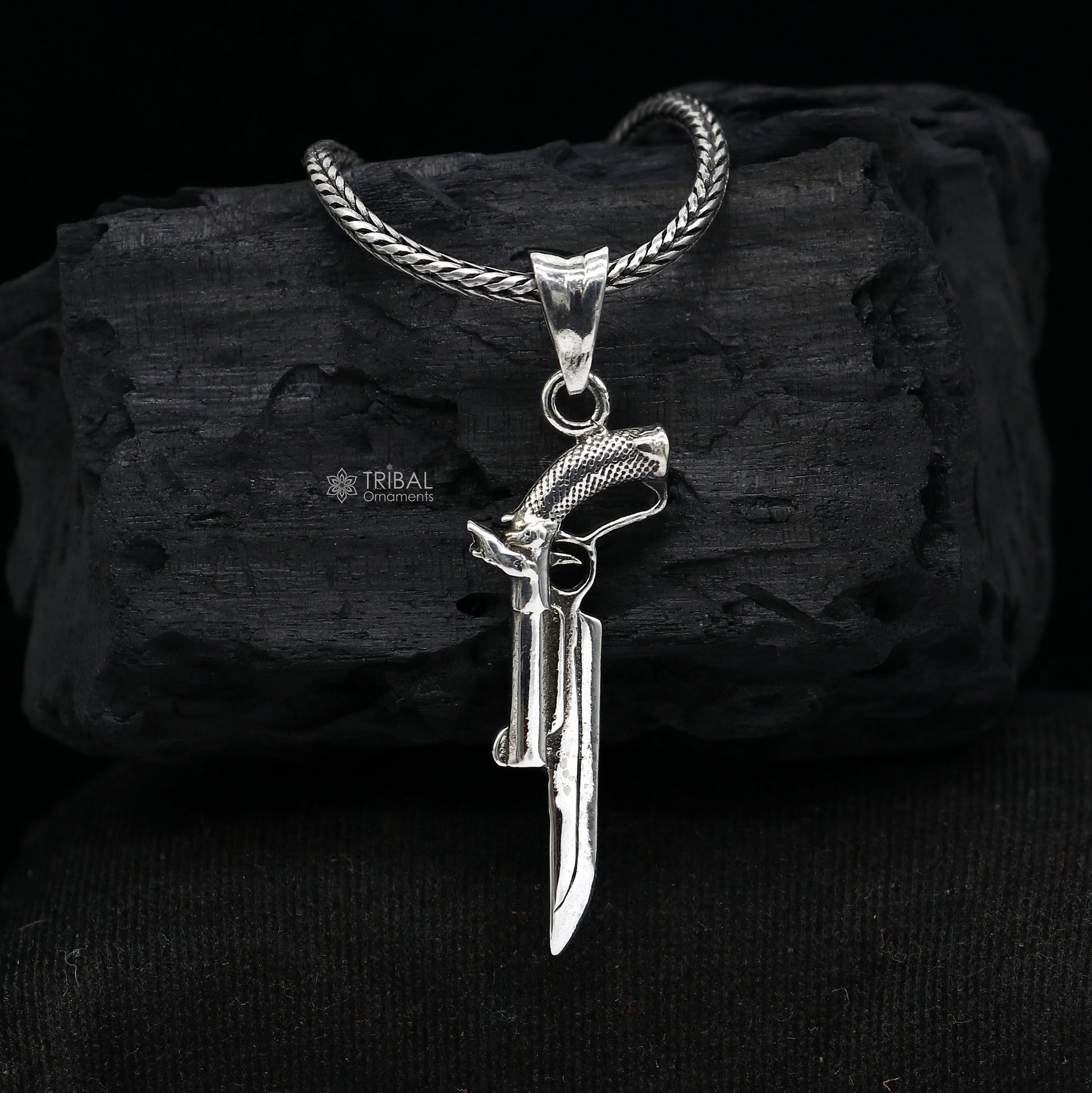 Sterling silver gun pendant from TRIBAL ORNAMENTS, unisex jewelry featuring a stylish revolver design for gifting.