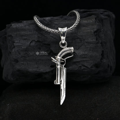 Sterling silver gun pendant from TRIBAL ORNAMENTS, unisex jewelry featuring a stylish revolver design for gifting.